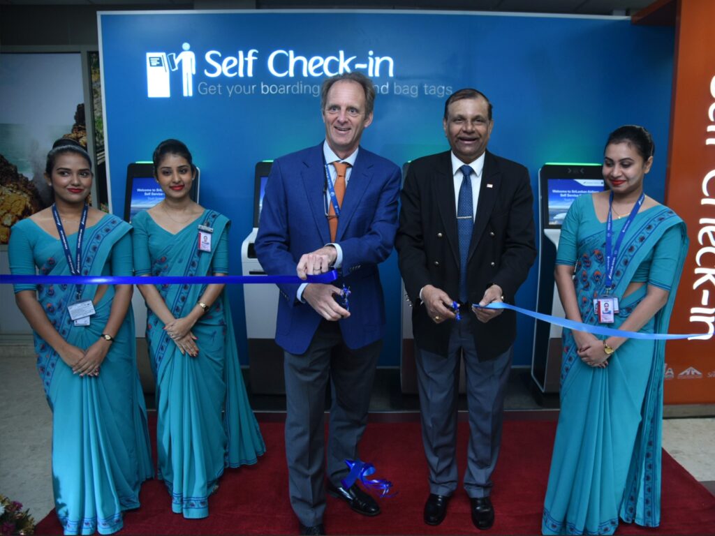 Richard Nuttall, Chief Executive Officer of SriLankan Airlines and Major General G. A. Chandrasiri, Chairman of Airport and Aviation Services (Sri Lanka) (Private) Limited cut the ribbon at the launch of SriLankan Airlines’ new self-service kiosks in the departure terminal of Bandaranaike International Airport on 14 November 2023.